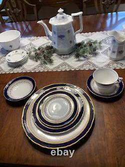 Royal Worcester china, Blue Regency pattern 12 5 piece place settings. 60 pieces