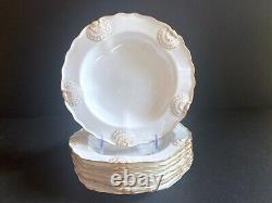 Set 8 Tiffany & Co. Plates by Royal Worcester, raised shell design, gold accent