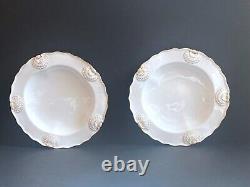 Set 8 Tiffany & Co. Plates by Royal Worcester, raised shell design, gold accent