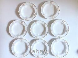 Set 8 Tiffany & Co. Plates by Royal Worcester, raised shell design, gold accent