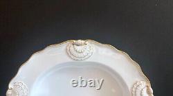 Set 8 Tiffany & Co. Plates by Royal Worcester, raised shell design, gold accent