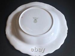 Set 8 Tiffany & Co. Plates by Royal Worcester, raised shell design, gold accent