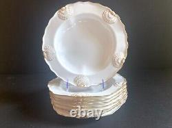 Set 8 Tiffany & Co. Plates by Royal Worcester, raised shell design, gold accent